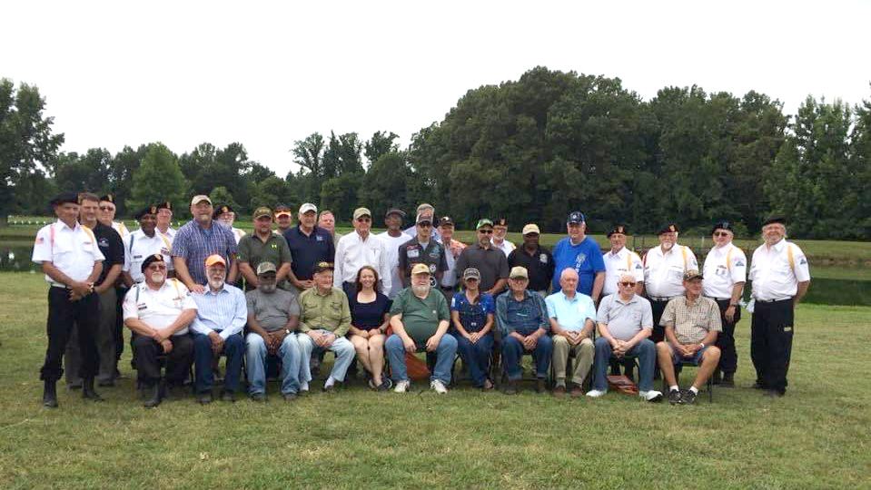 A group of 35 farmer-veterans pose for a photo